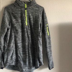 Gray zips up jacket